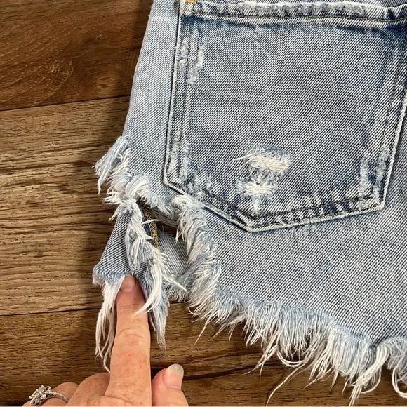 Agolde high waisted distressed jean shorts 25