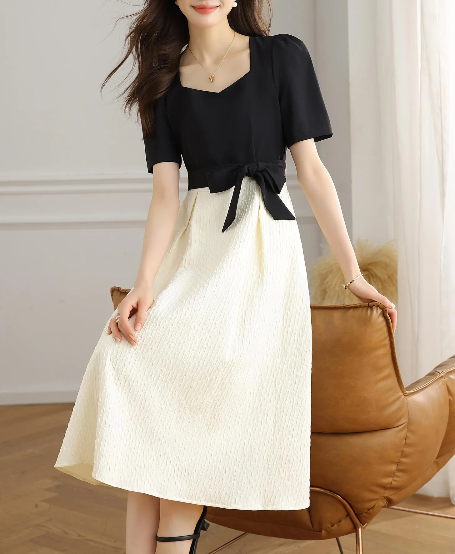 Chic Black and White Faux Two-Piece T-Shirt Dress for a Modern Look