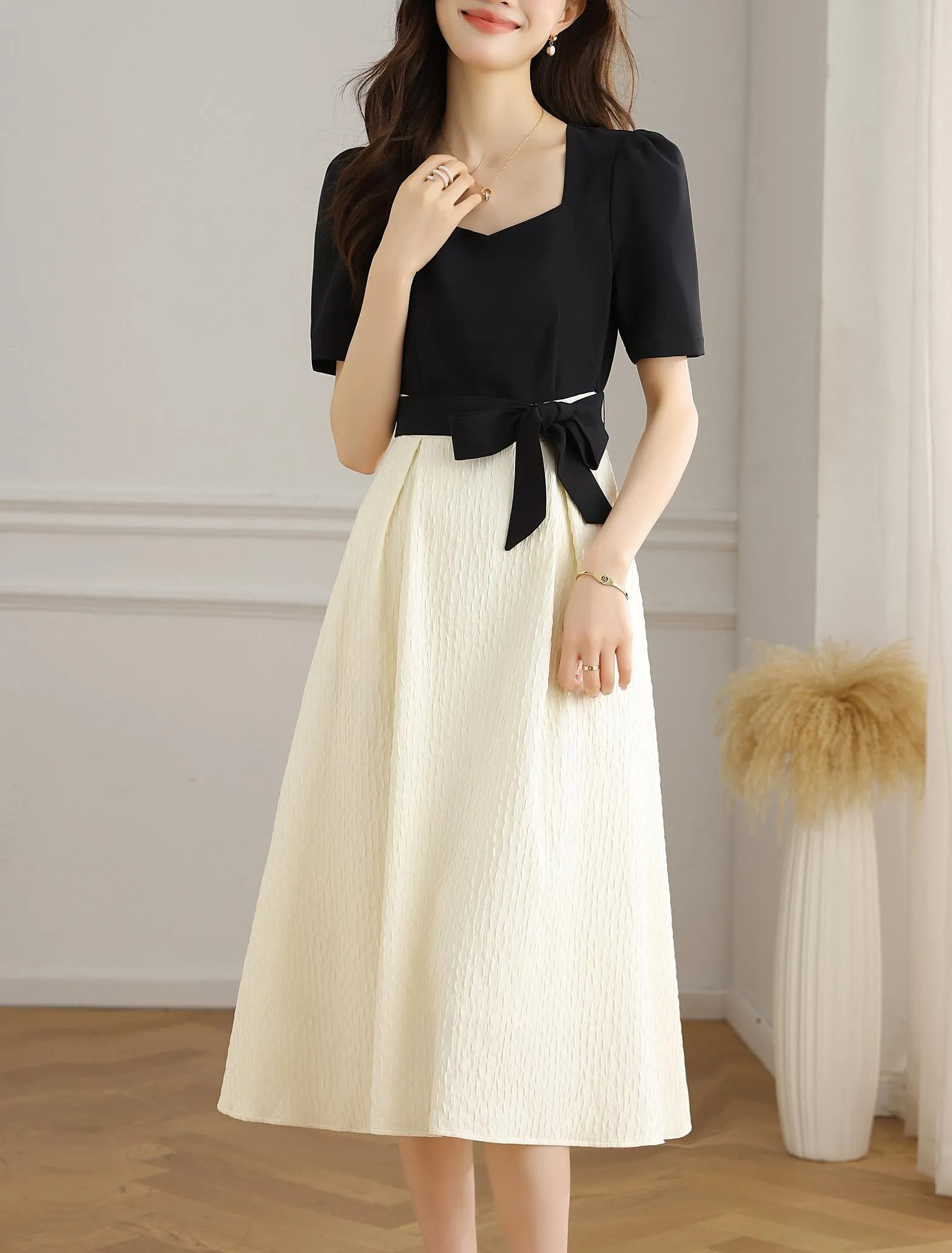 Chic Black and White Faux Two-Piece T-Shirt Dress for a Modern Look