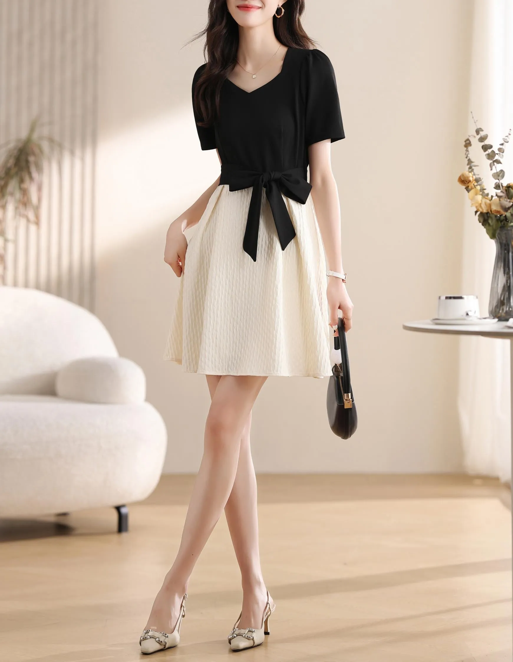 Chic Black and White Faux Two-Piece T-Shirt Dress for a Modern Look