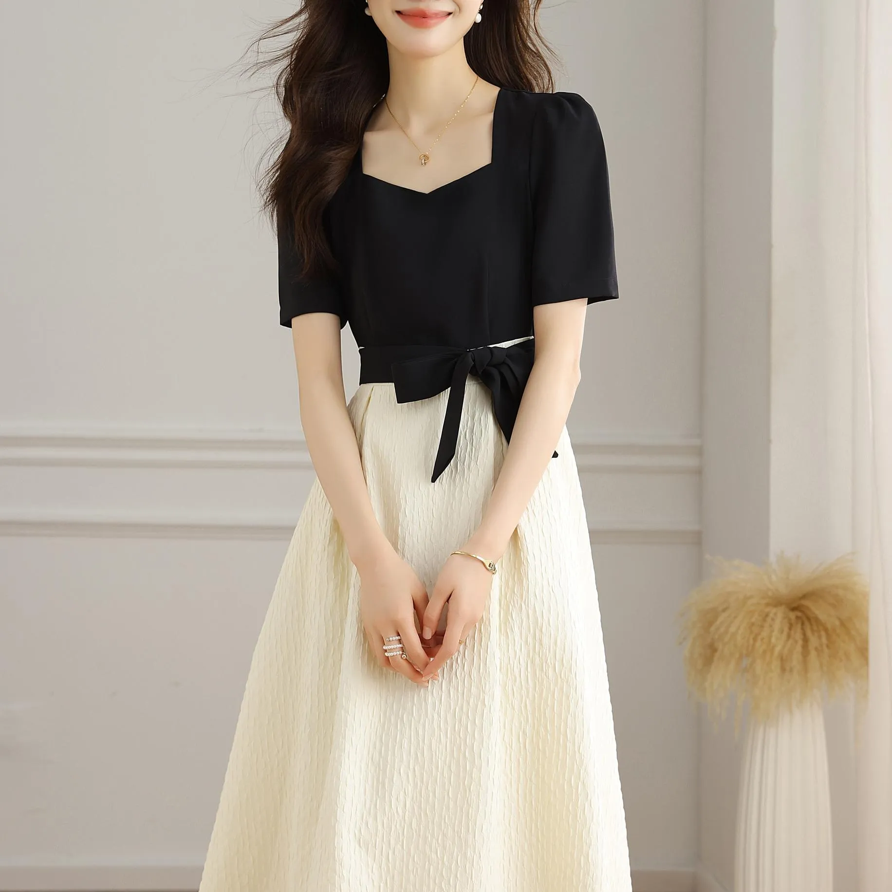 Chic Black and White Faux Two-Piece T-Shirt Dress for a Modern Look