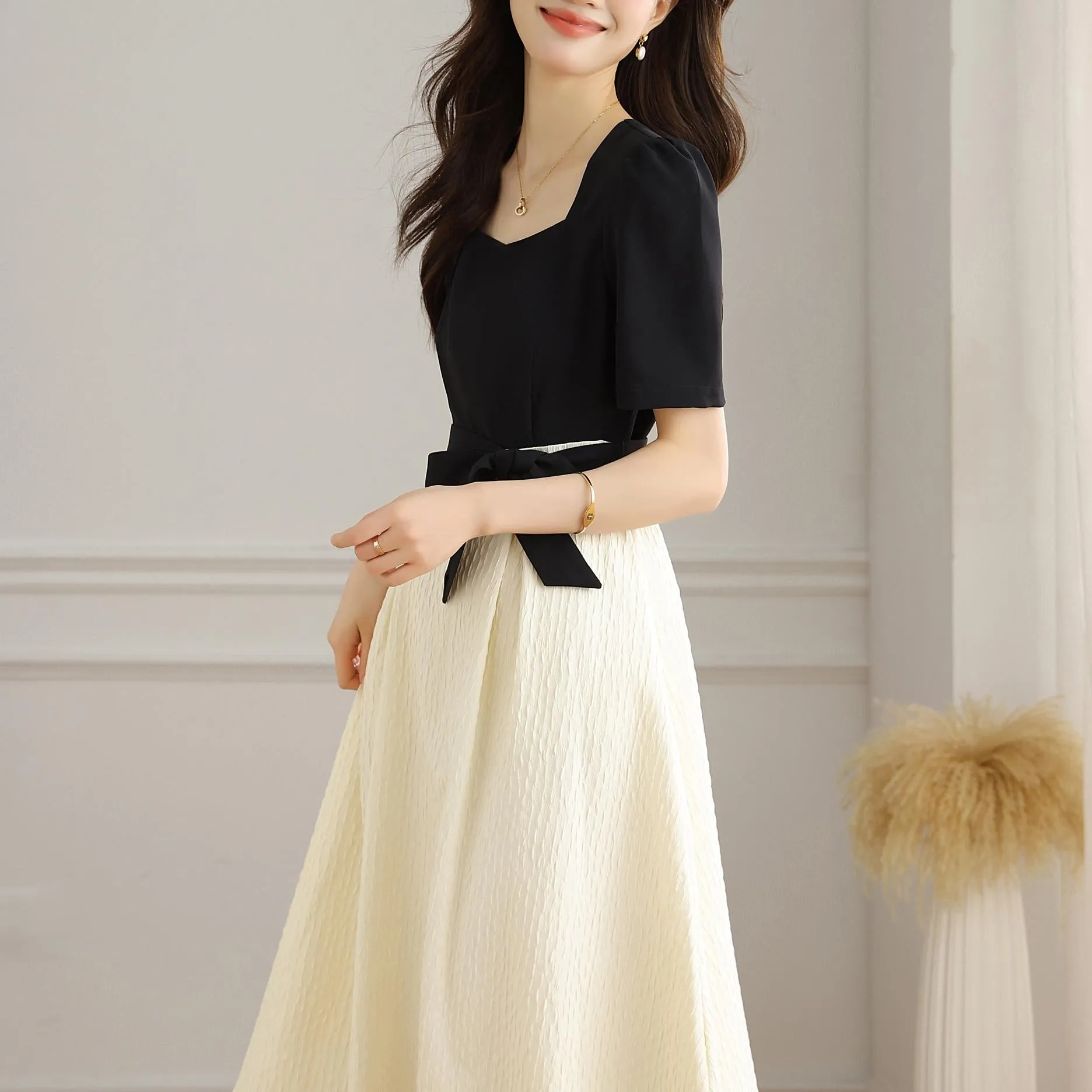 Chic Black and White Faux Two-Piece T-Shirt Dress for a Modern Look