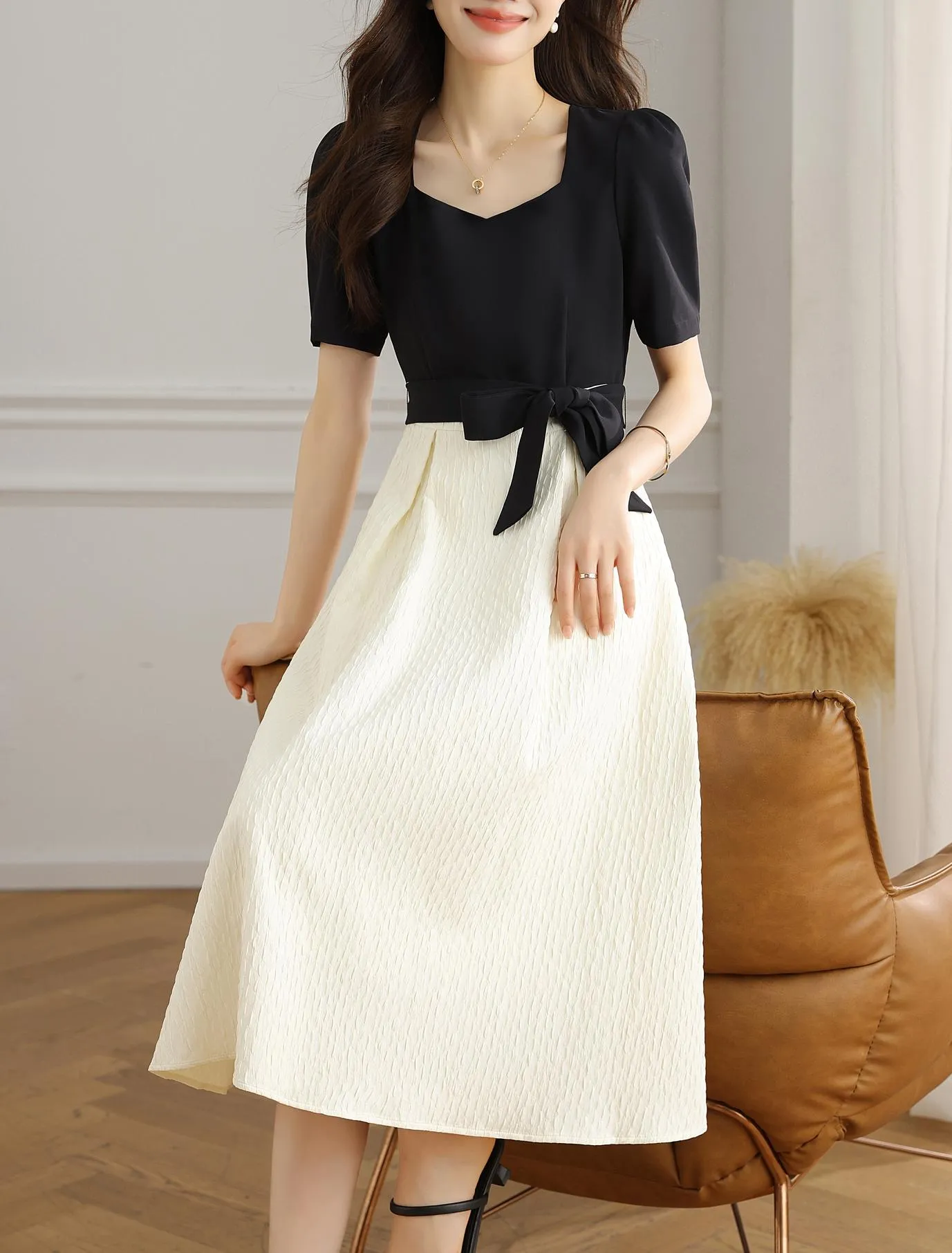 Chic Black and White Faux Two-Piece T-Shirt Dress for a Modern Look