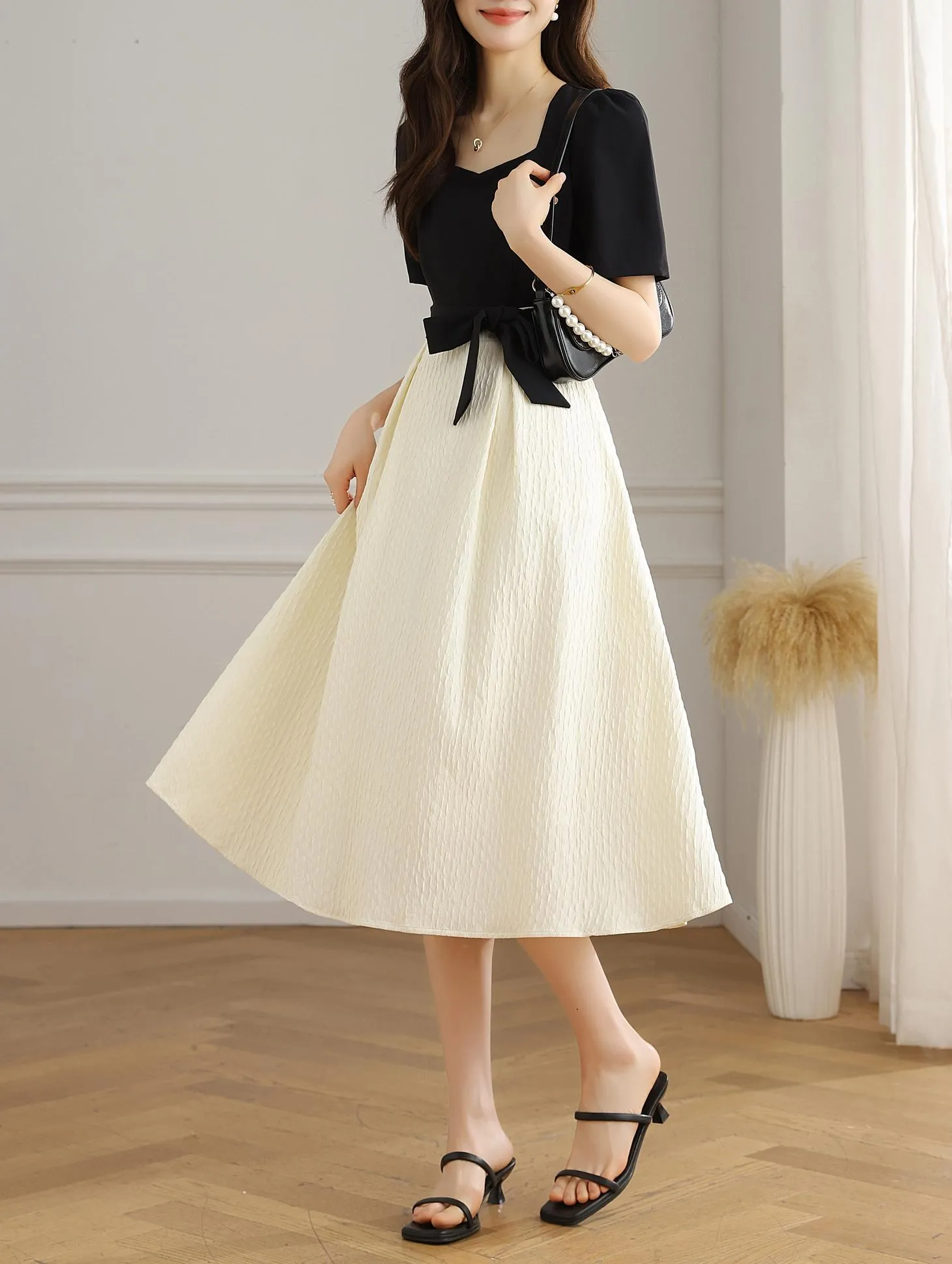 Chic Black and White Faux Two-Piece T-Shirt Dress for a Modern Look