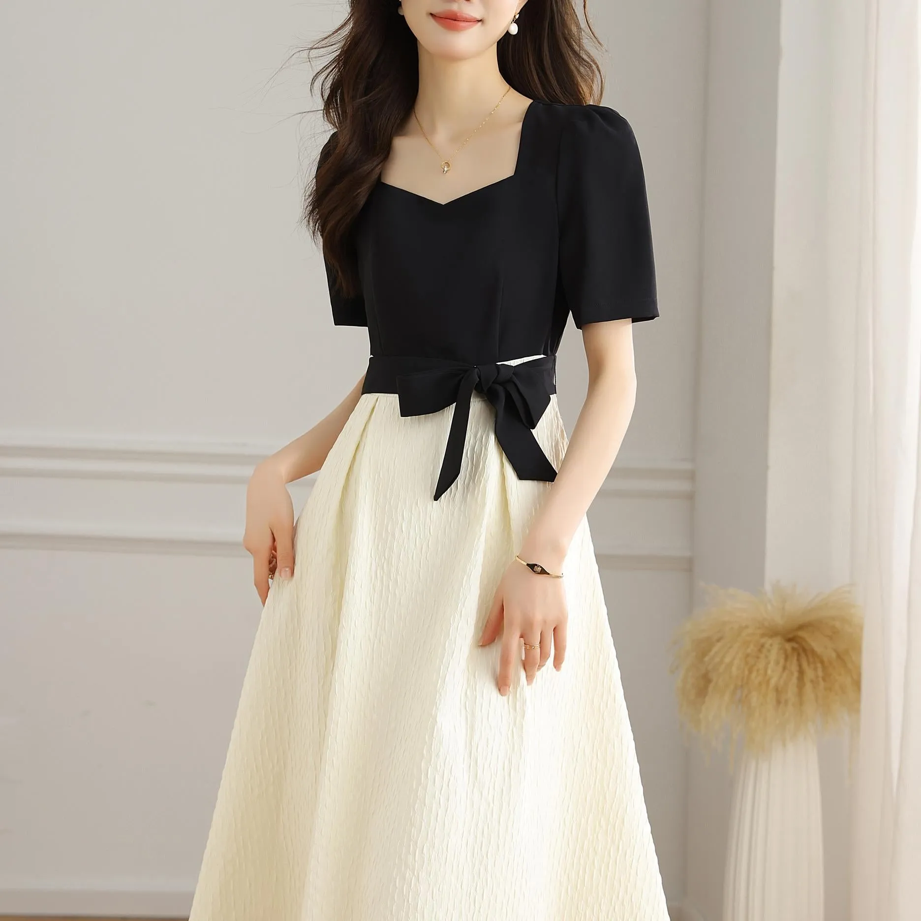 Chic Black and White Faux Two-Piece T-Shirt Dress for a Modern Look