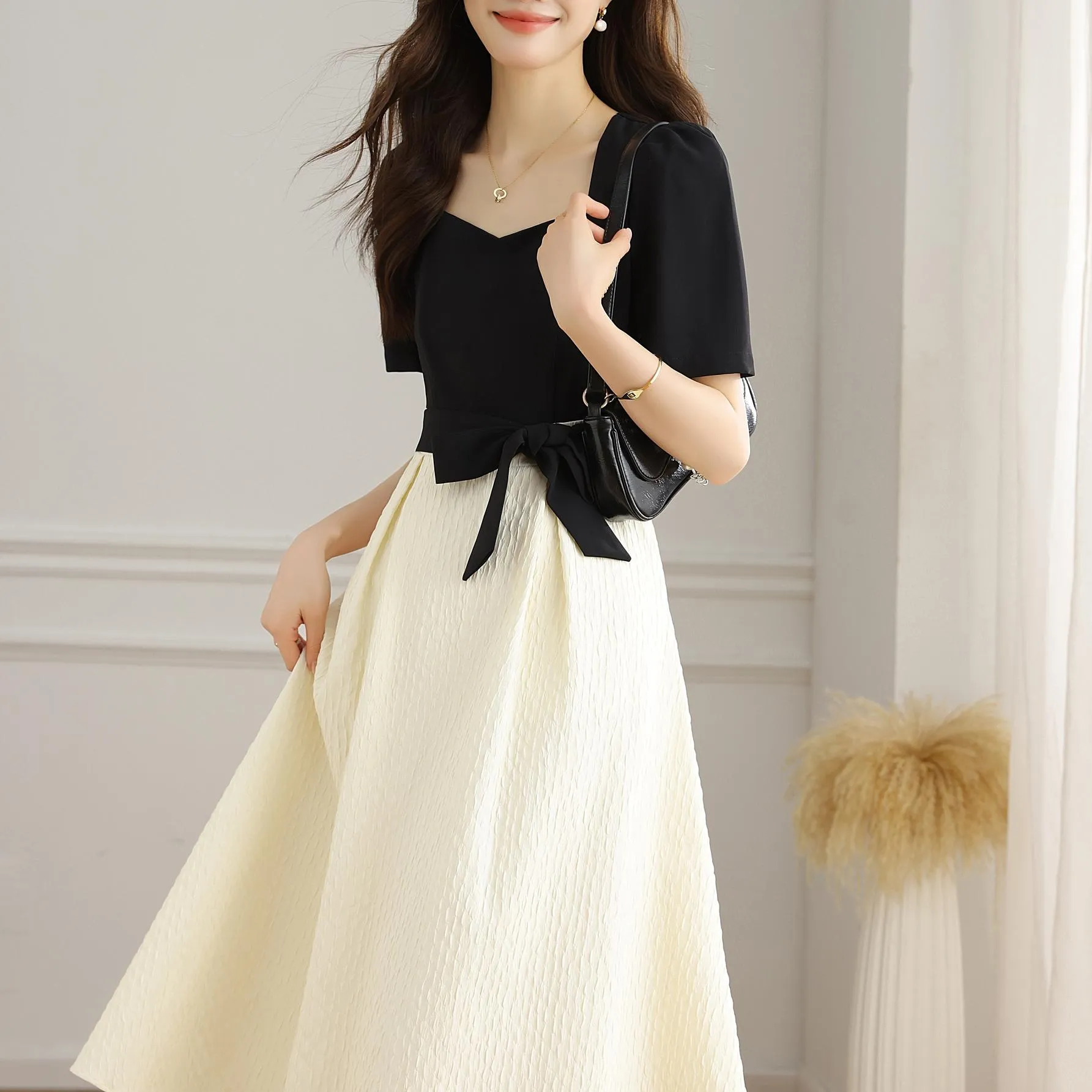 Chic Black and White Faux Two-Piece T-Shirt Dress for a Modern Look