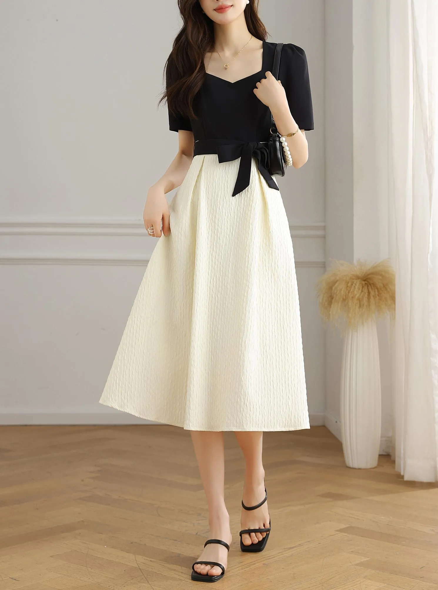 Chic Black and White Faux Two-Piece T-Shirt Dress for a Modern Look