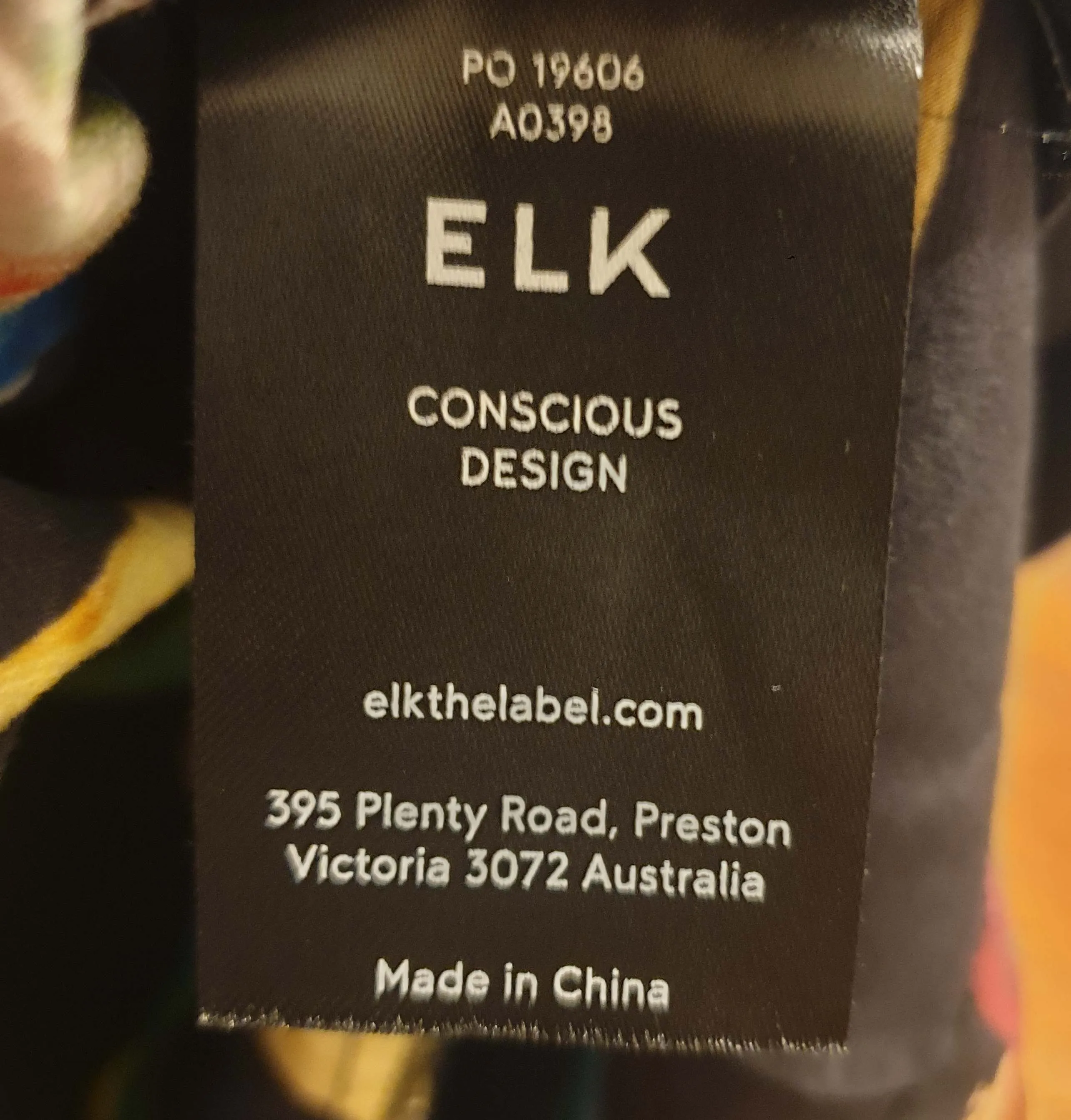 Elk colourful wrap style top size 16