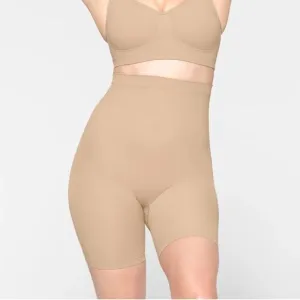 SKIMS Seamless Sculpt Mid Thigh High Waisted Tummy Control Shape Shorts In Clay