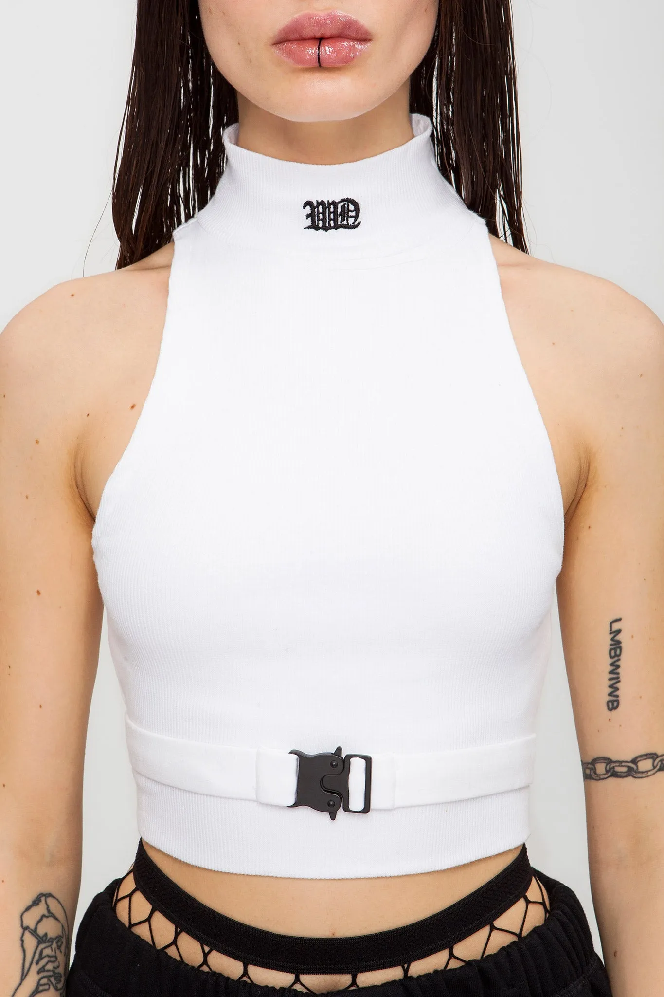 Sleeveless Buckle Turtleneck Top