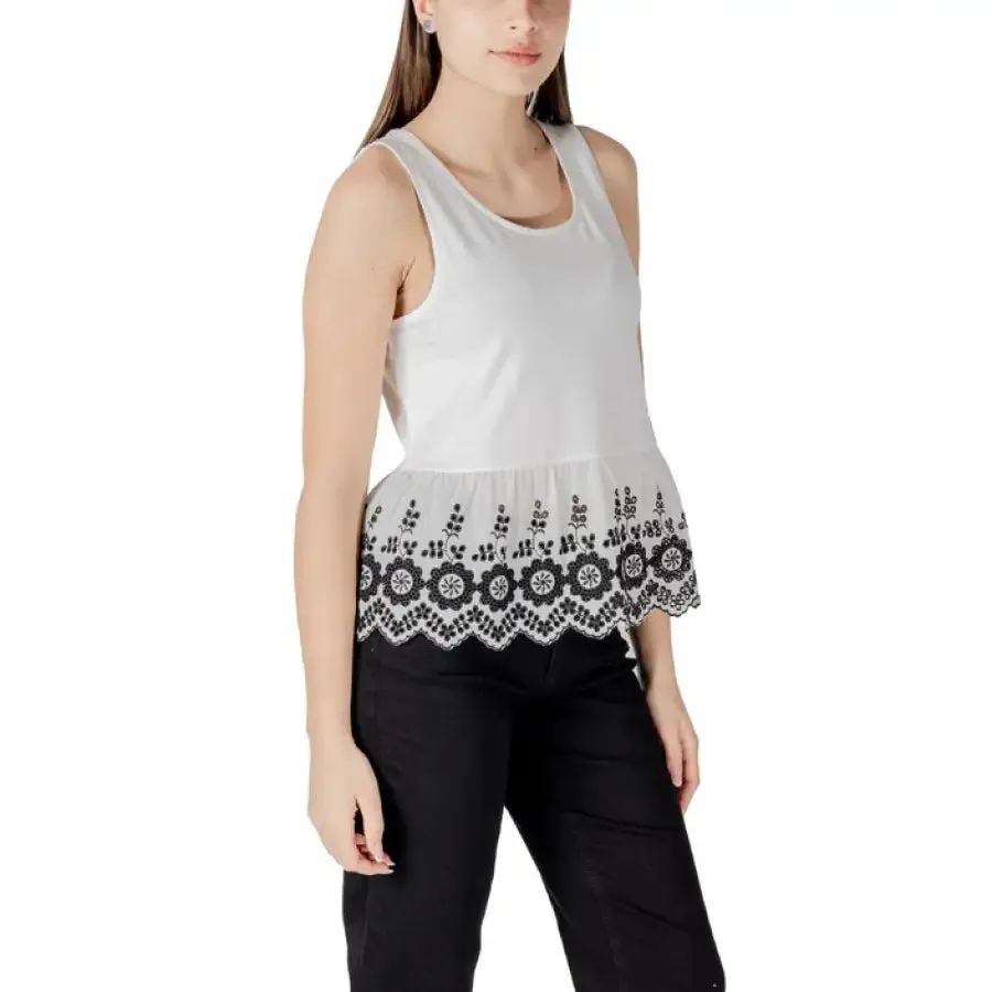 White Sleeveless Top with Black Floral Trim