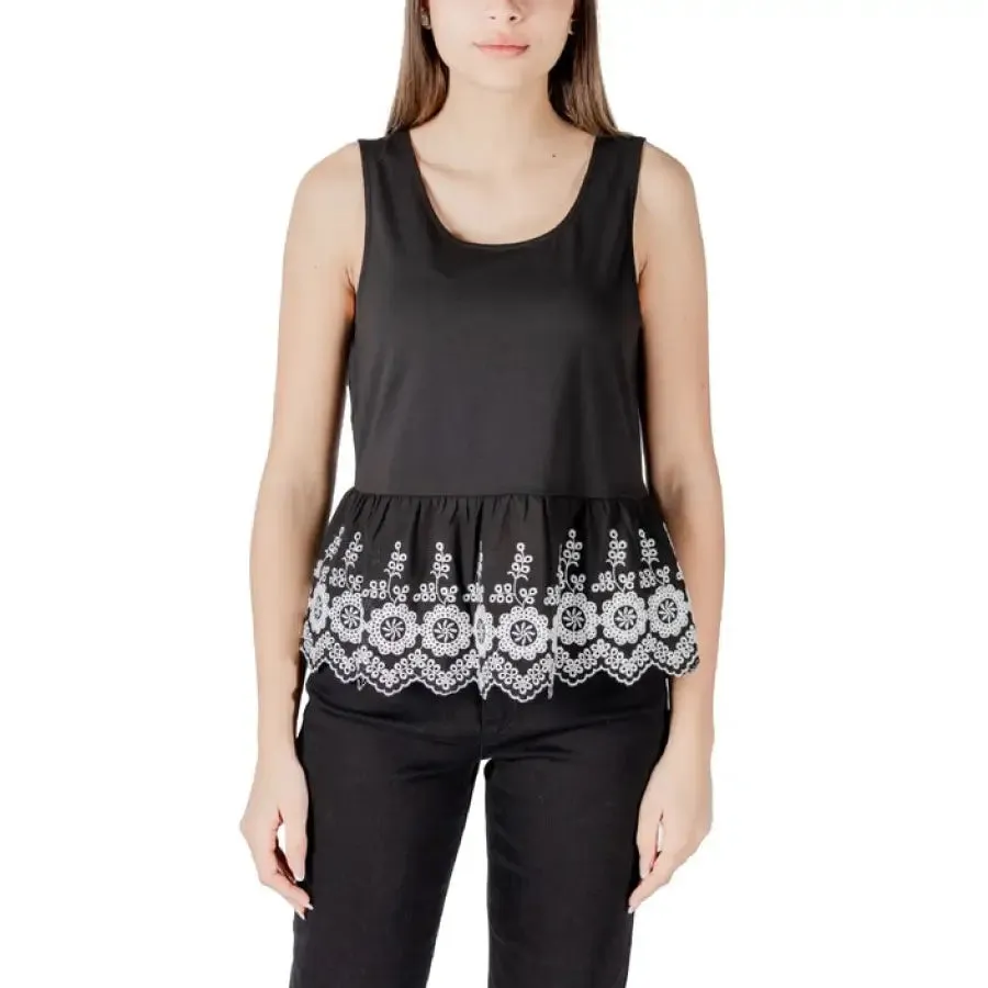 White Sleeveless Top with Black Floral Trim